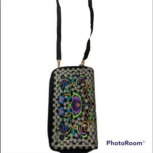 Unique wallet purse with cell phone pocket.